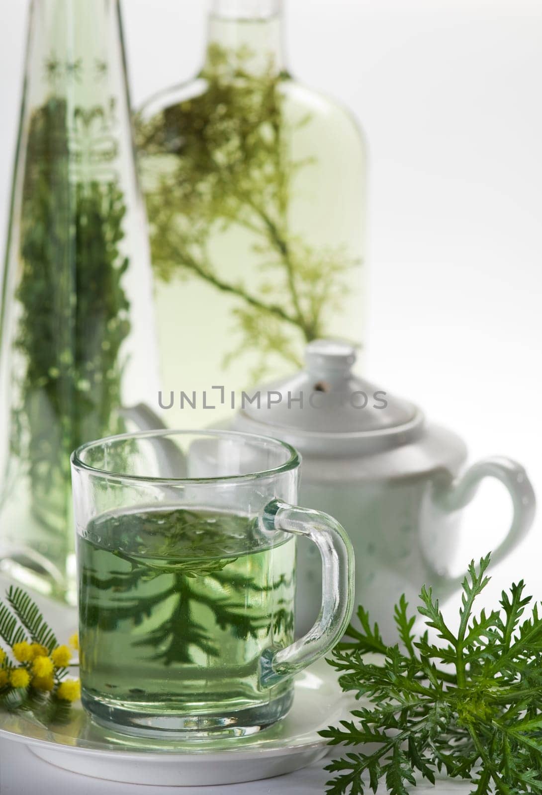 green tea with herbs close up shoot