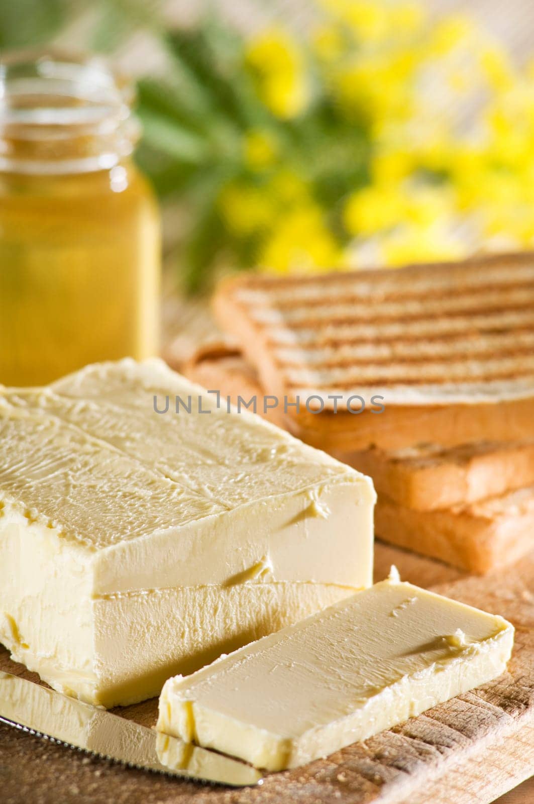 fresh butter slice vith toast bread close up shoot