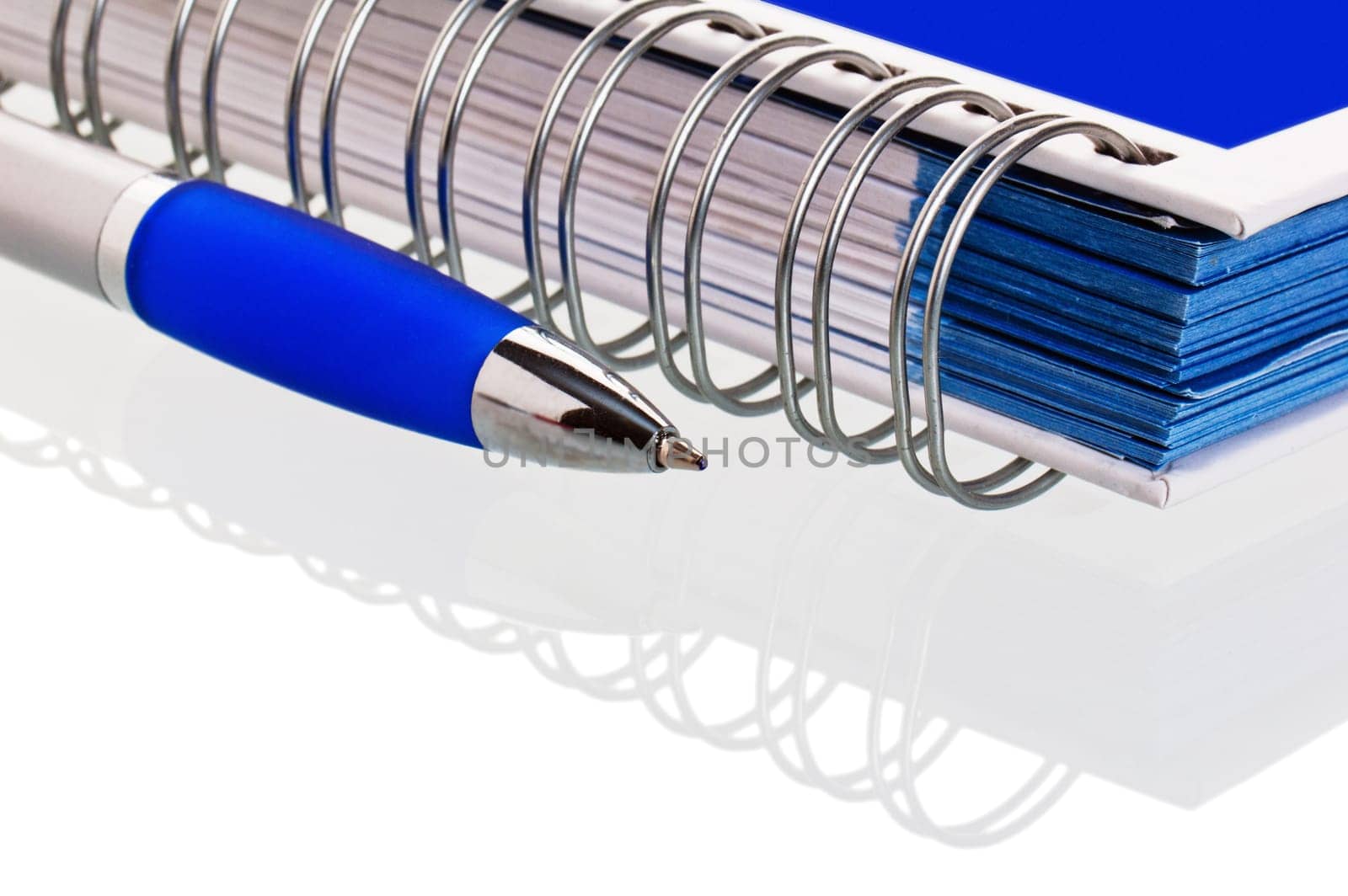 Pencil with a notebook. A close up