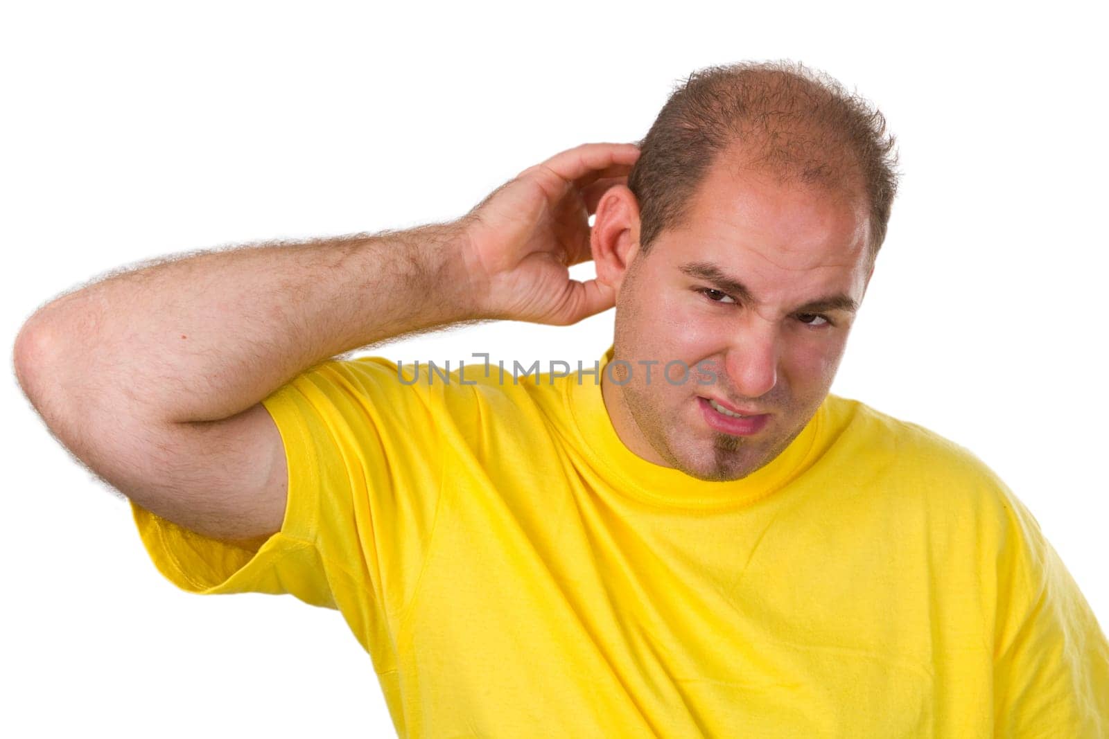 Young man tearing his hair - isolated on white background
