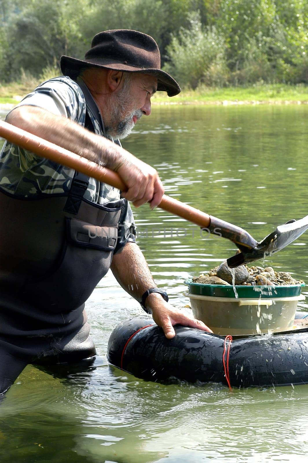 prospector panning for gold in rivers in France in the Gard region
