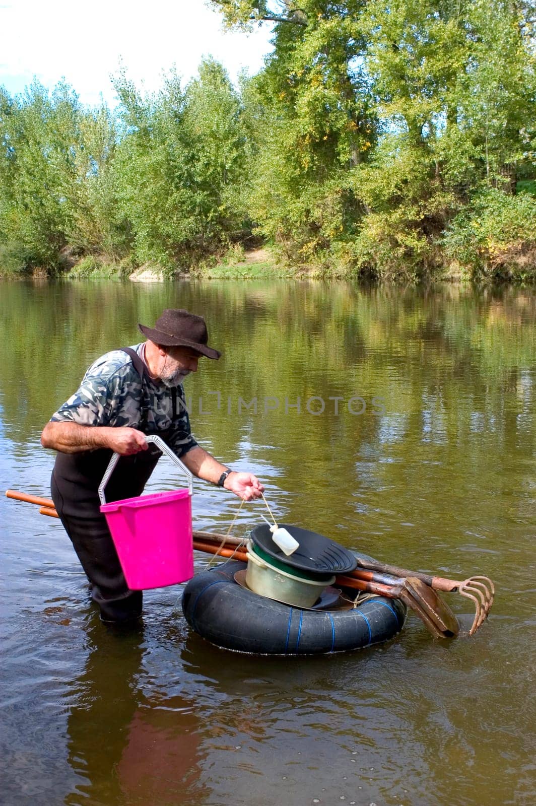prospector panning for gold in rivers in France in the Gard region