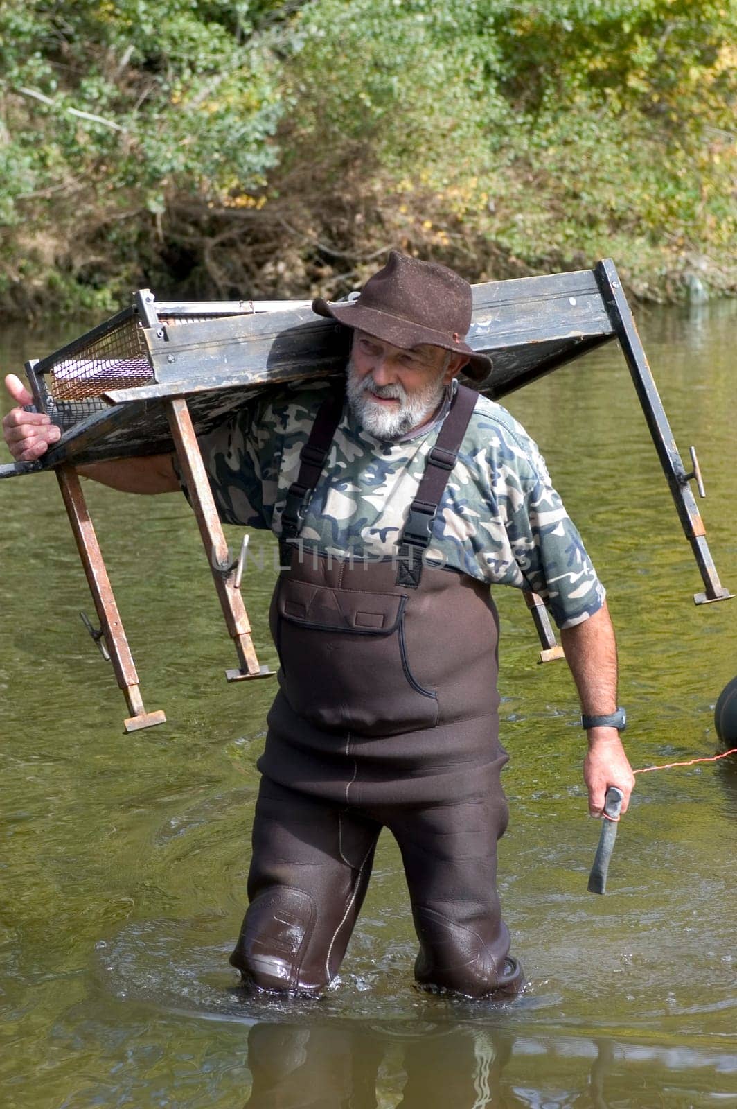 prospector panning for gold in rivers in France in the Gard region