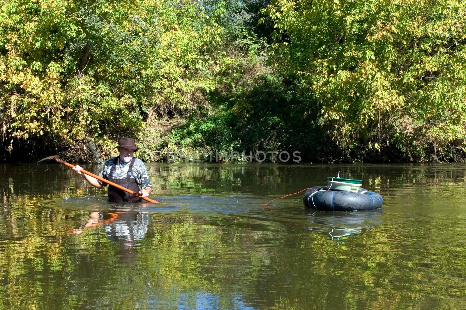 prospector panning for gold in rivers in France in the Gard region