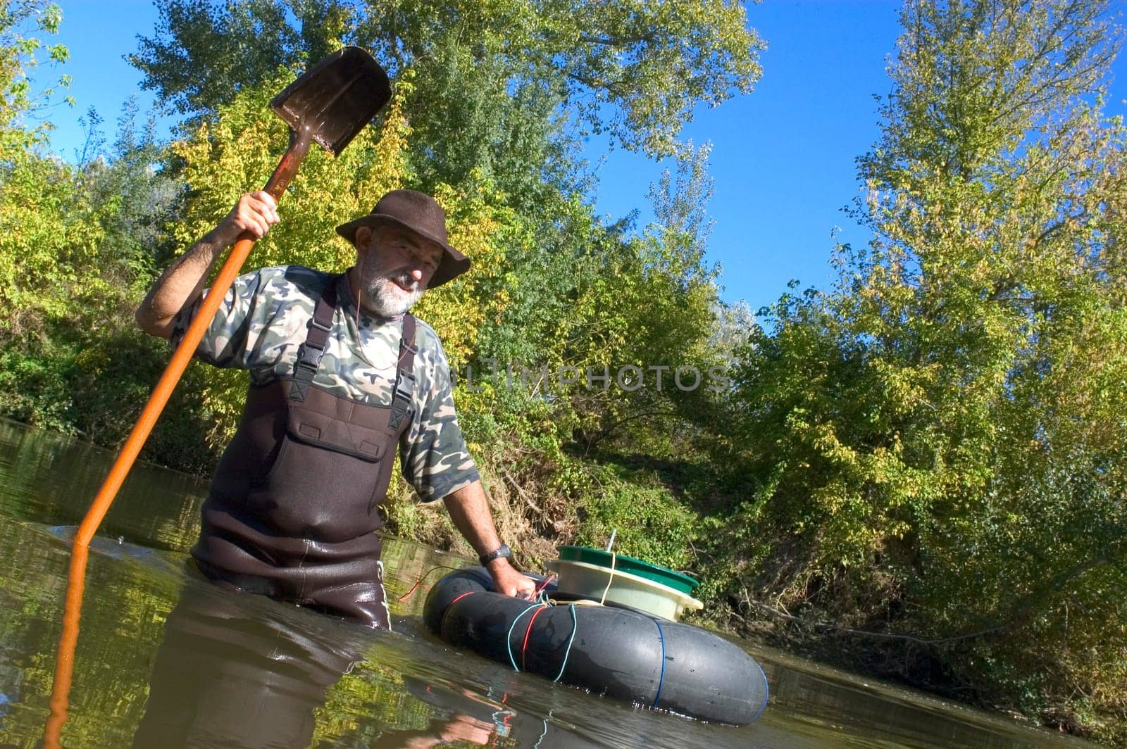 prospector panning for gold in rivers in France in the Gard region