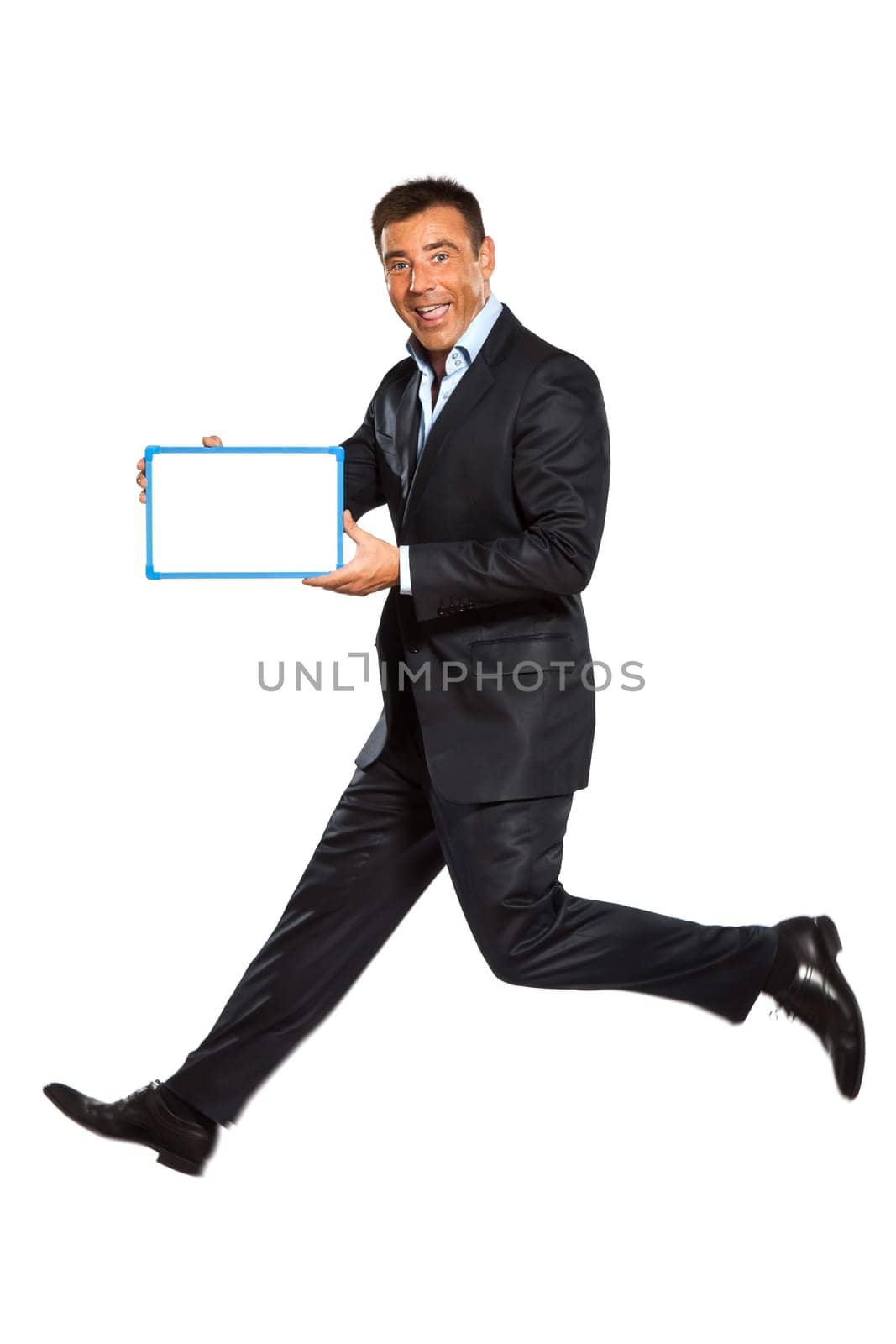 one caucasian business man running jumping double thumbs up holding whiteboard in studio isolated on white background