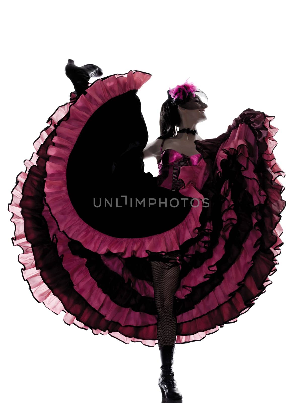 woman dancer dancing french cancan in studio isolated on white background