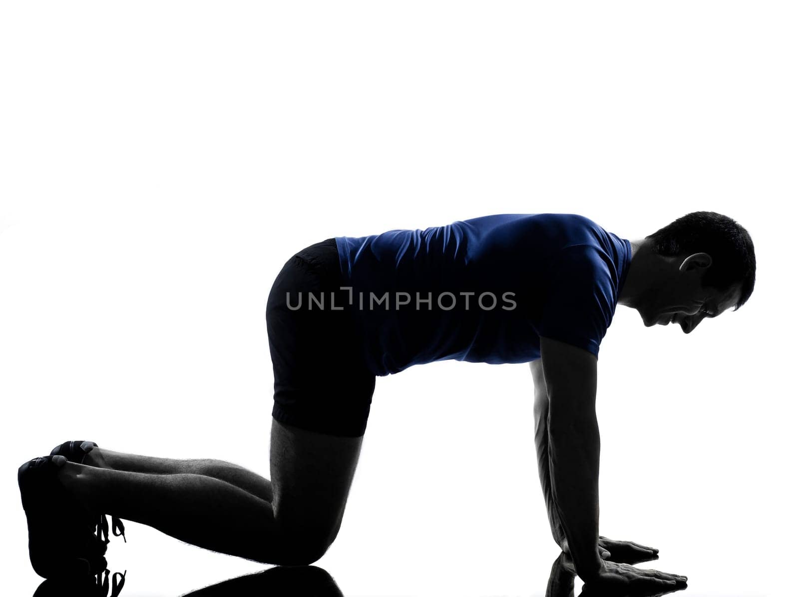 man exercising workout fitness aerobics posture in silhouette studio isolated on white background