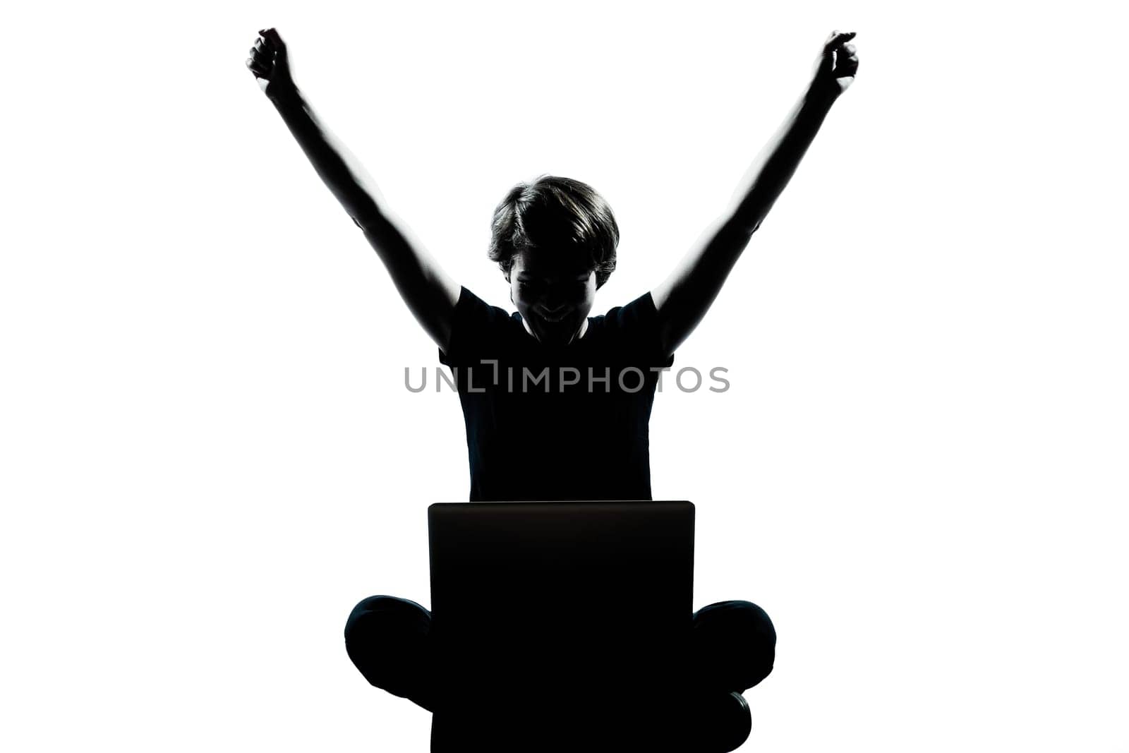 one caucasian young teenager silhouette boy  girl computer computing laptop happy success full length in studio cut out isolated on white background