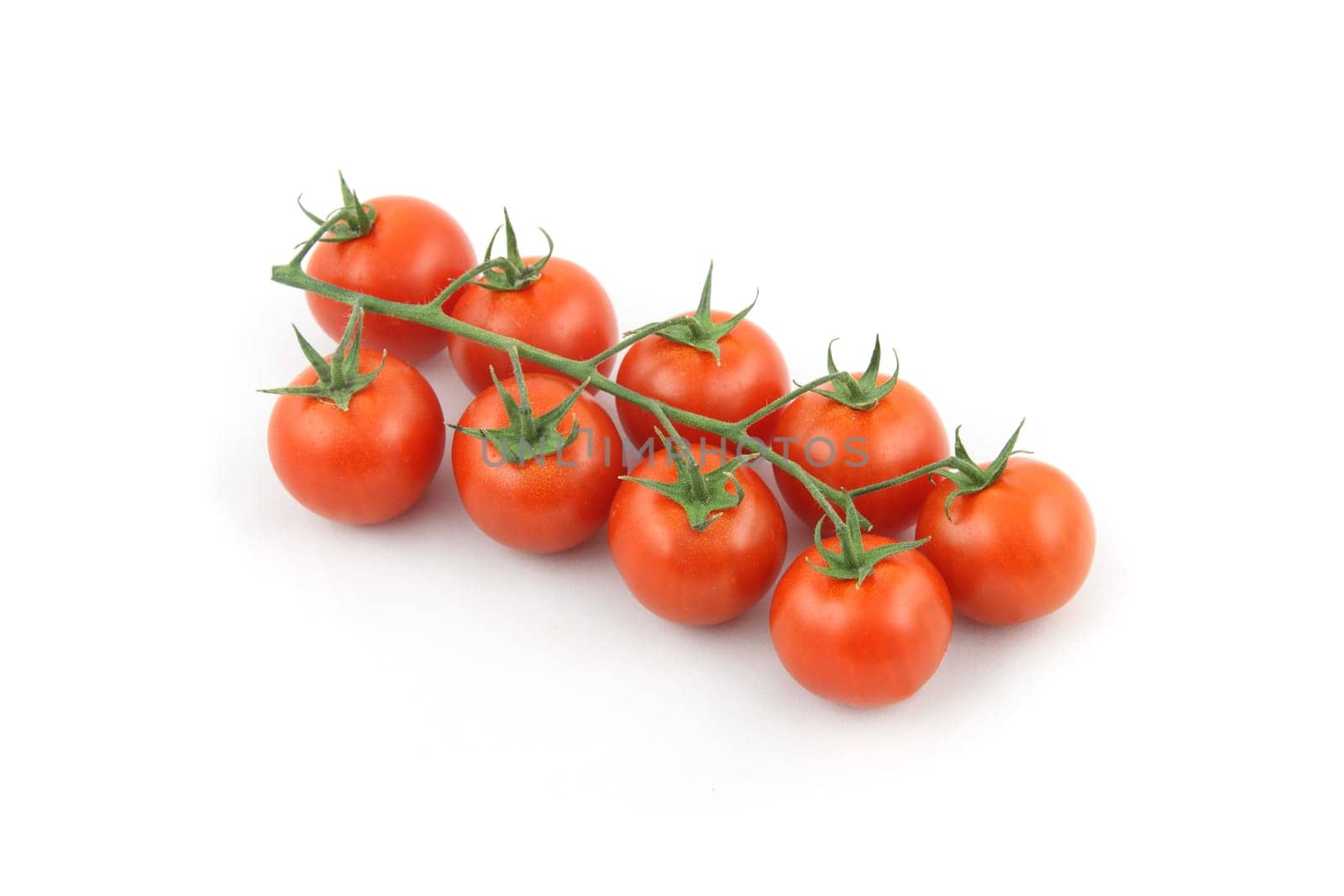 details of cherry tomato isolated on white
