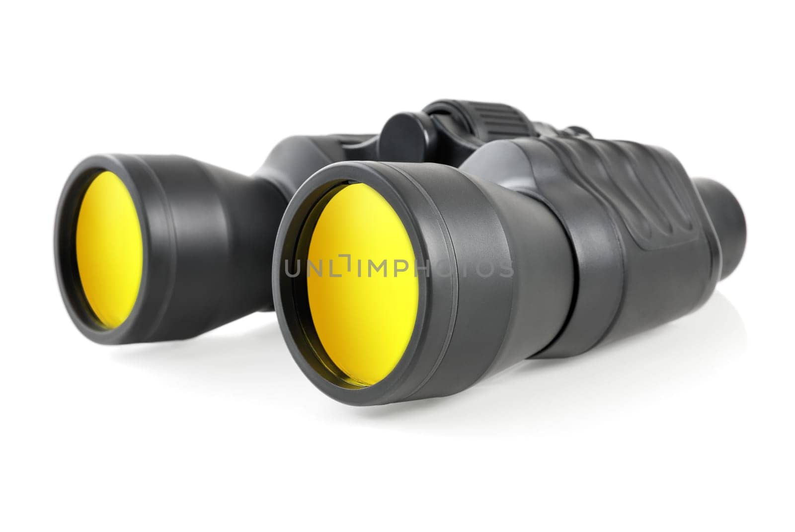 Studio shot of modern binoculars with yellow lenses on white background