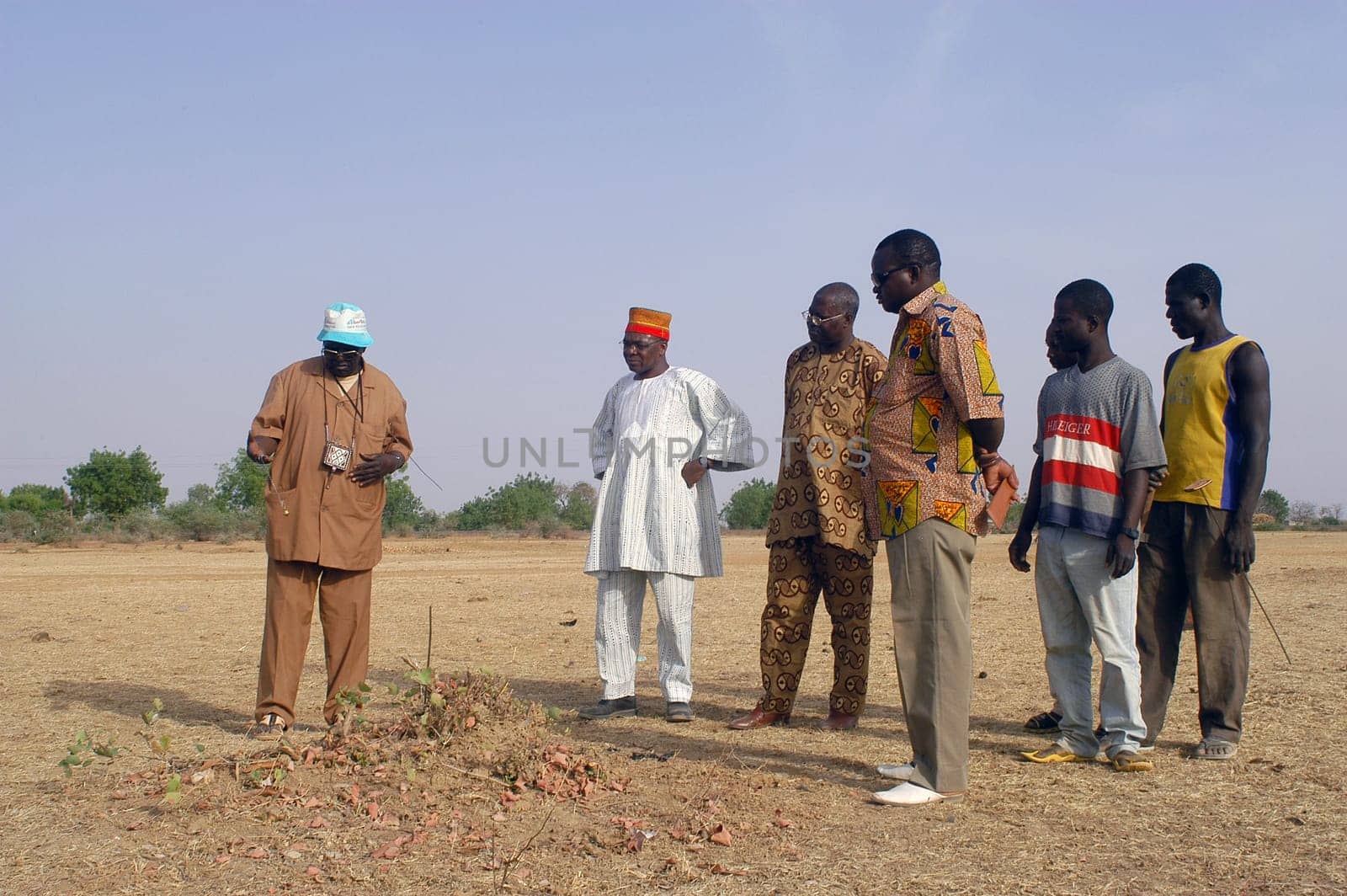 African waterfinder with work in an area of Burkina Faso Faso. Water is not rare in Africa, only it is necessary to drill wells to reach it. The waterfinder thus determines the place exact where to drill because drilling costs 8000 ? and it is not questio