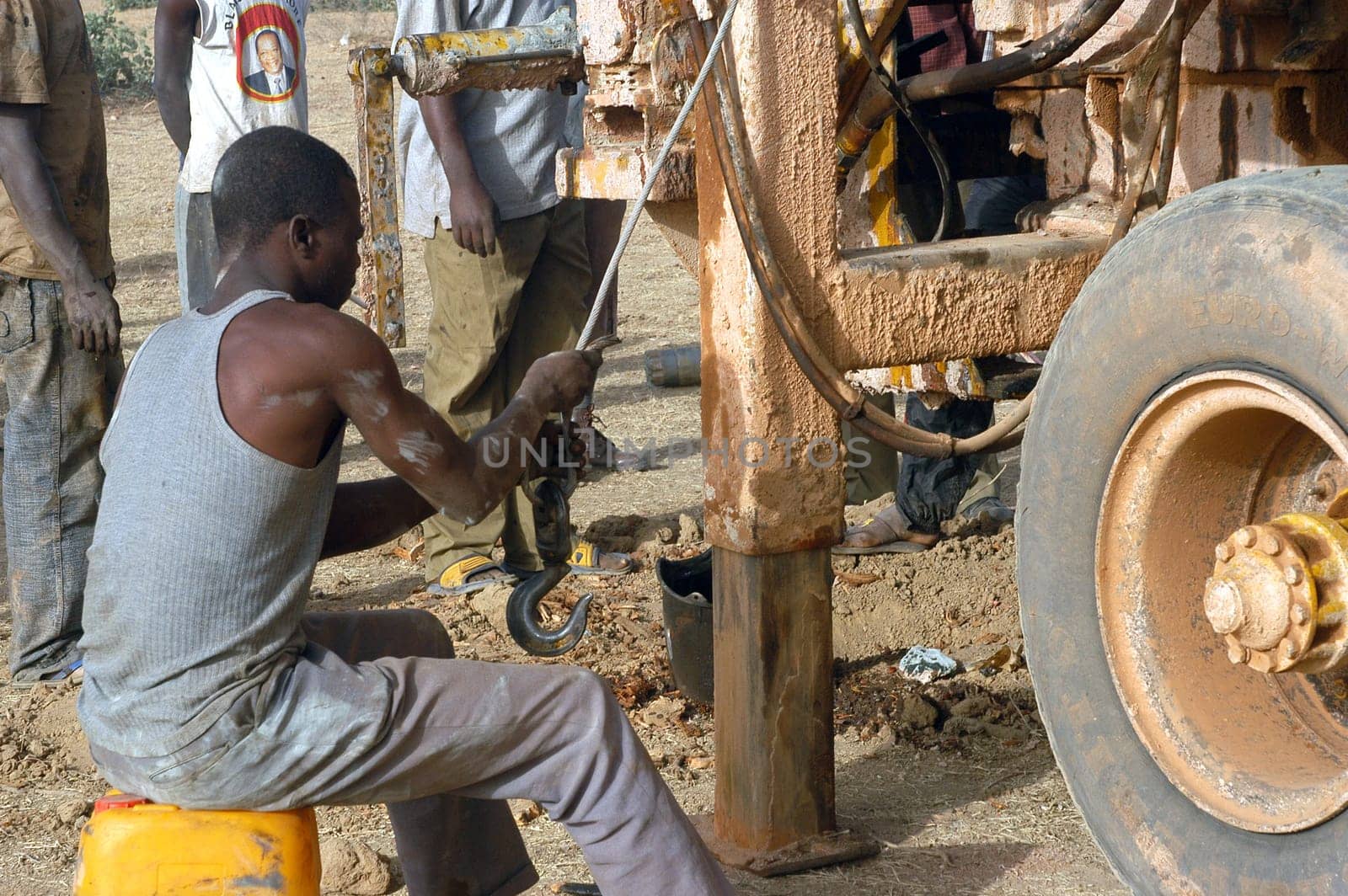 All stages of the drilling of a well in Burkina Faso Faso. Water is with 40 meters of depth and it is necessary to use a truck of drilling. To final manual pump will be assembled so that the well is protected from all pollution outside. A well costs 8000