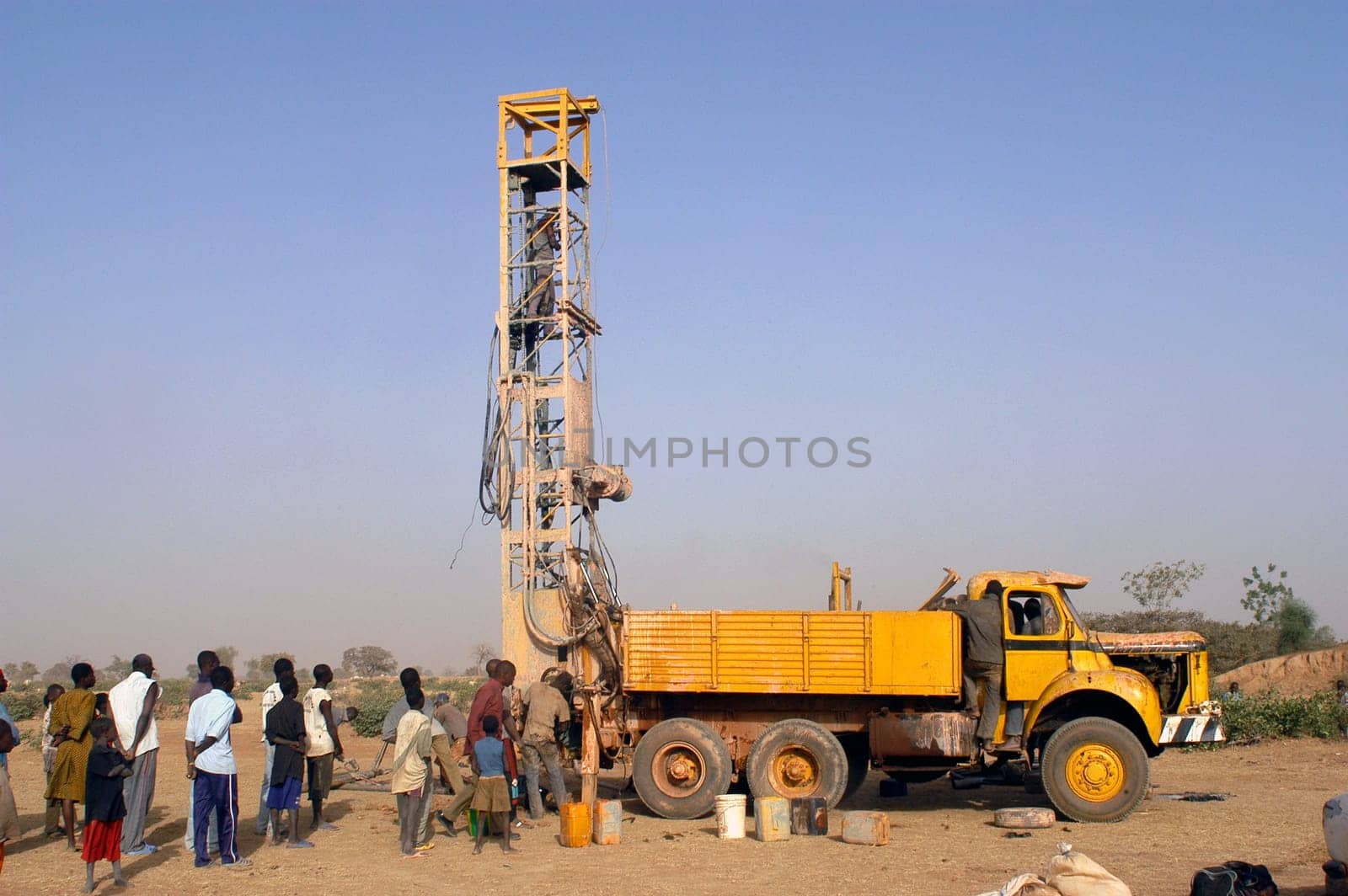 All stages of the drilling of a well in Burkina Faso Faso. Water is with 40 meters of depth and it is necessary to use a truck of drilling. To final manual pump will be assembled so that the well is protected from all pollution outside. A well costs 8000