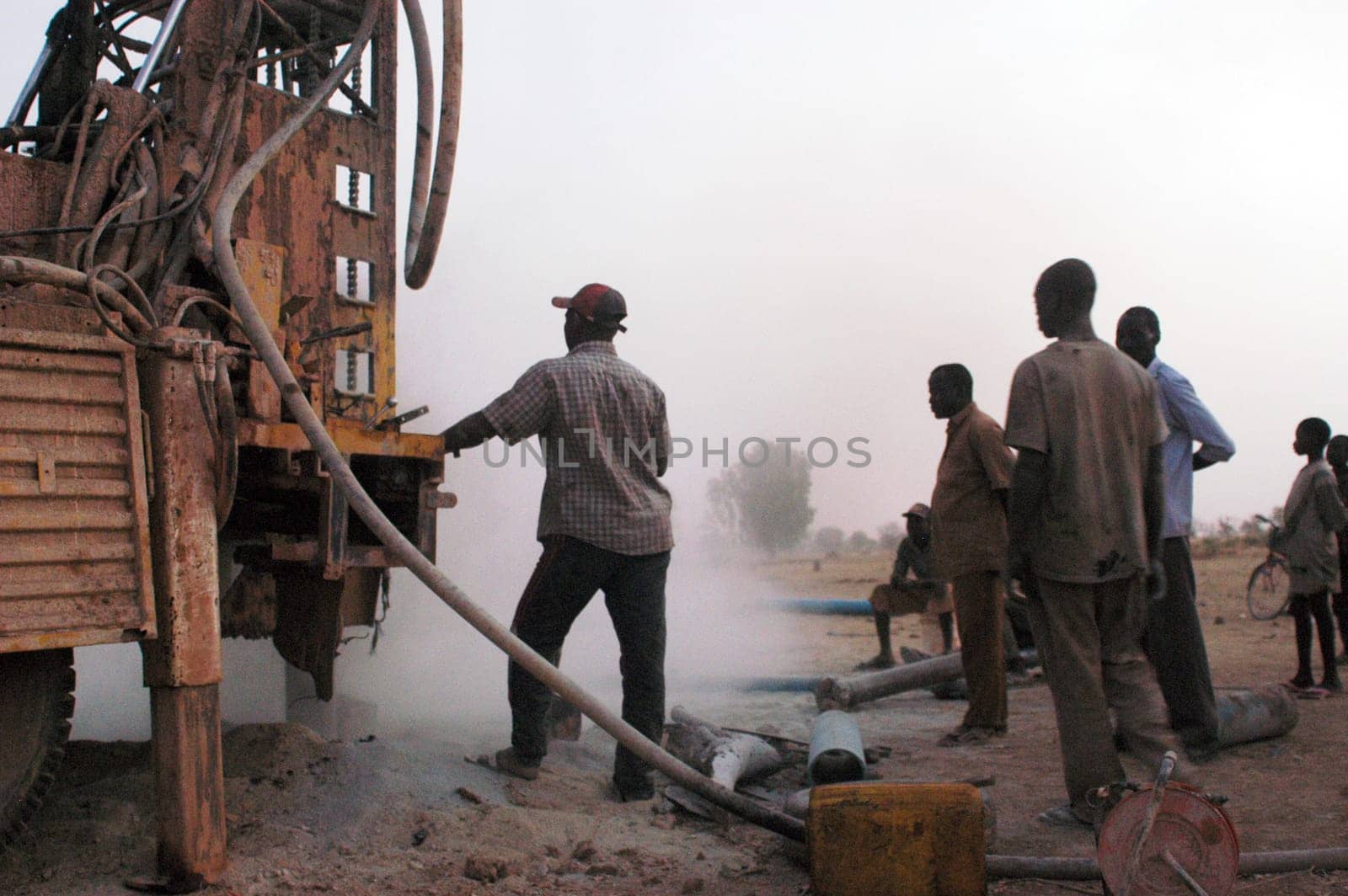 All stages of the drilling of a well in Burkina Faso Faso. Water is with 40 meters of depth and it is necessary to use a truck of drilling. To final manual pump will be assembled so that the well is protected from all pollution outside. A well costs 8000