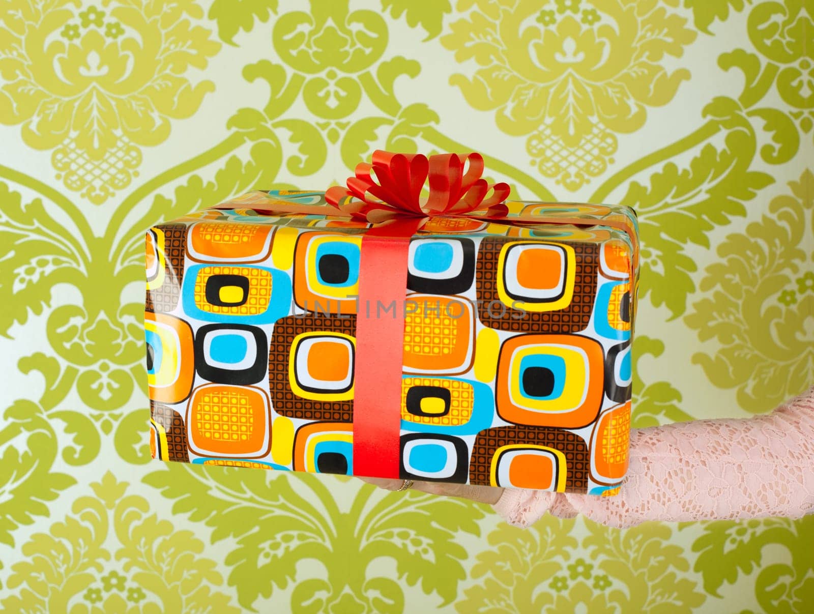 gift vintage retro present on hand in wallpaper background