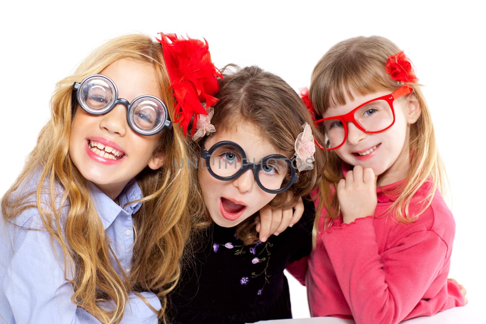 nerd children girl group with glasses and funny expression