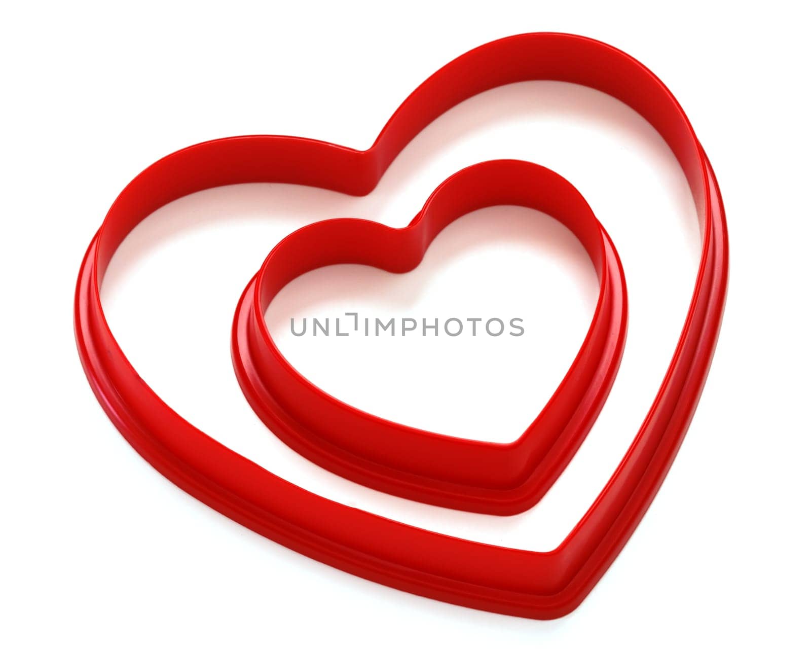 two hearts over white background