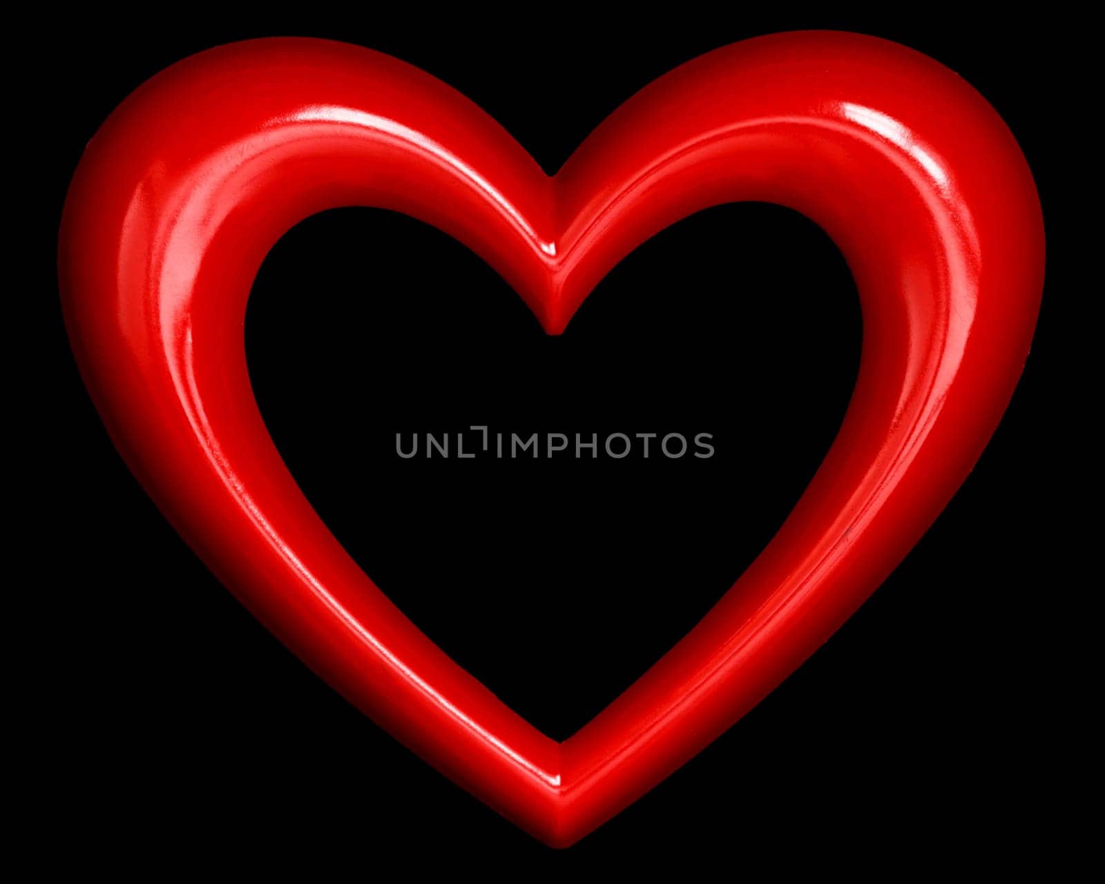 red heart shape over black background