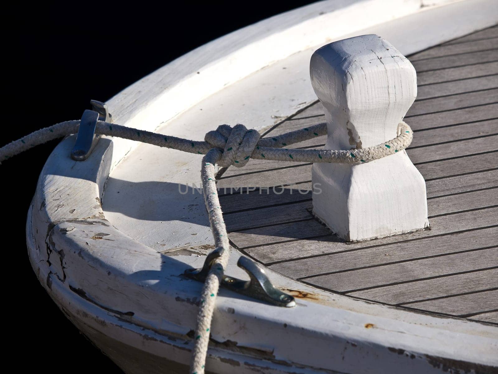 ropes on the boat docked in the harbour