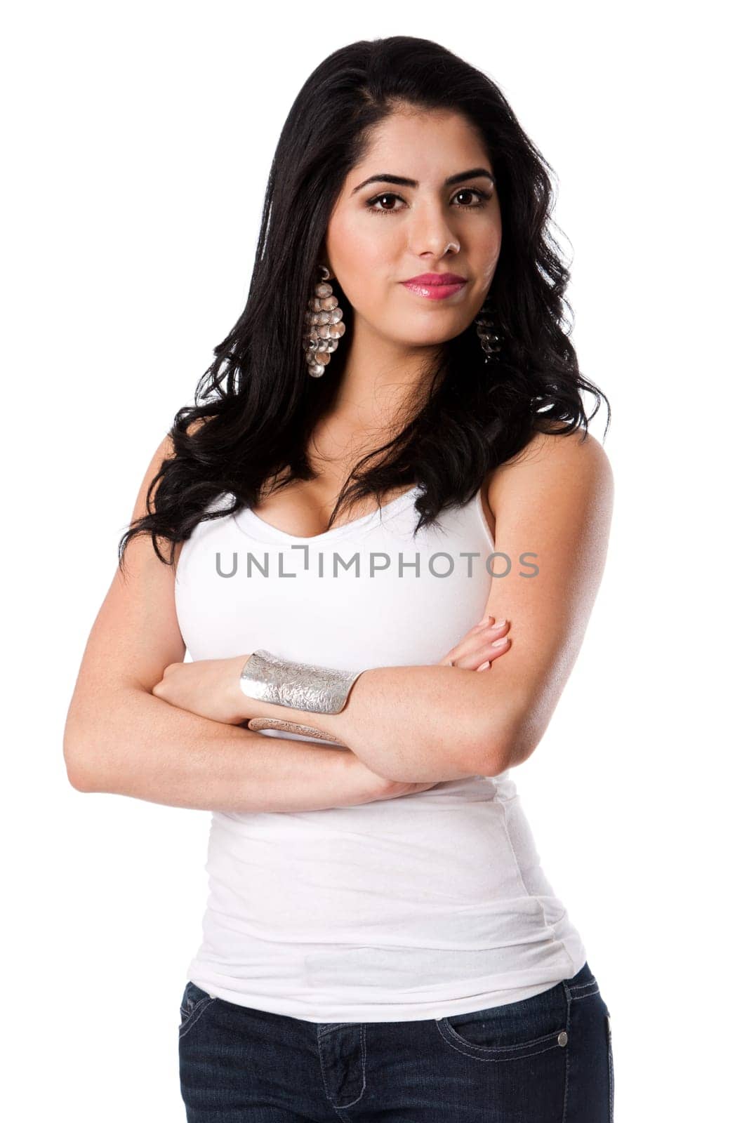 Beautiful confident self-secure attractive young woman standing with arms crosses wearing white shirt, isolated.