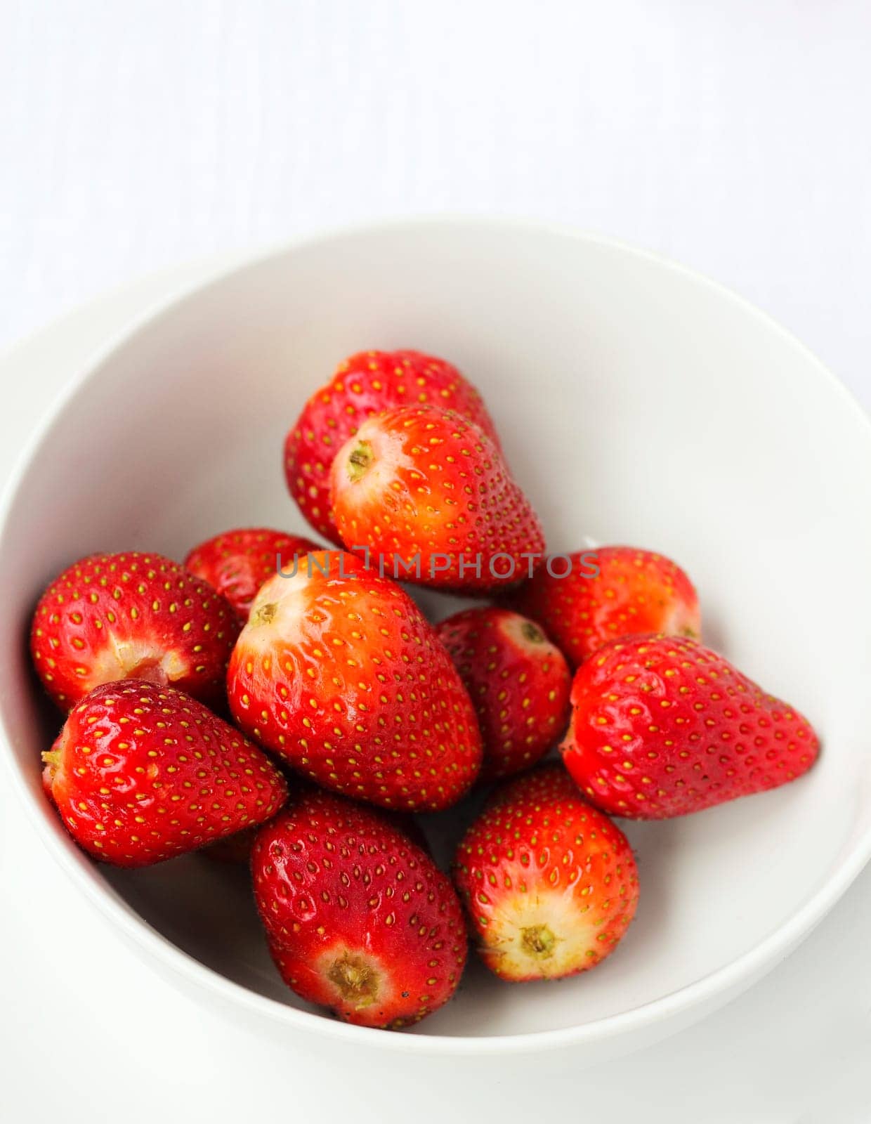 A bowl of ripe strawberries