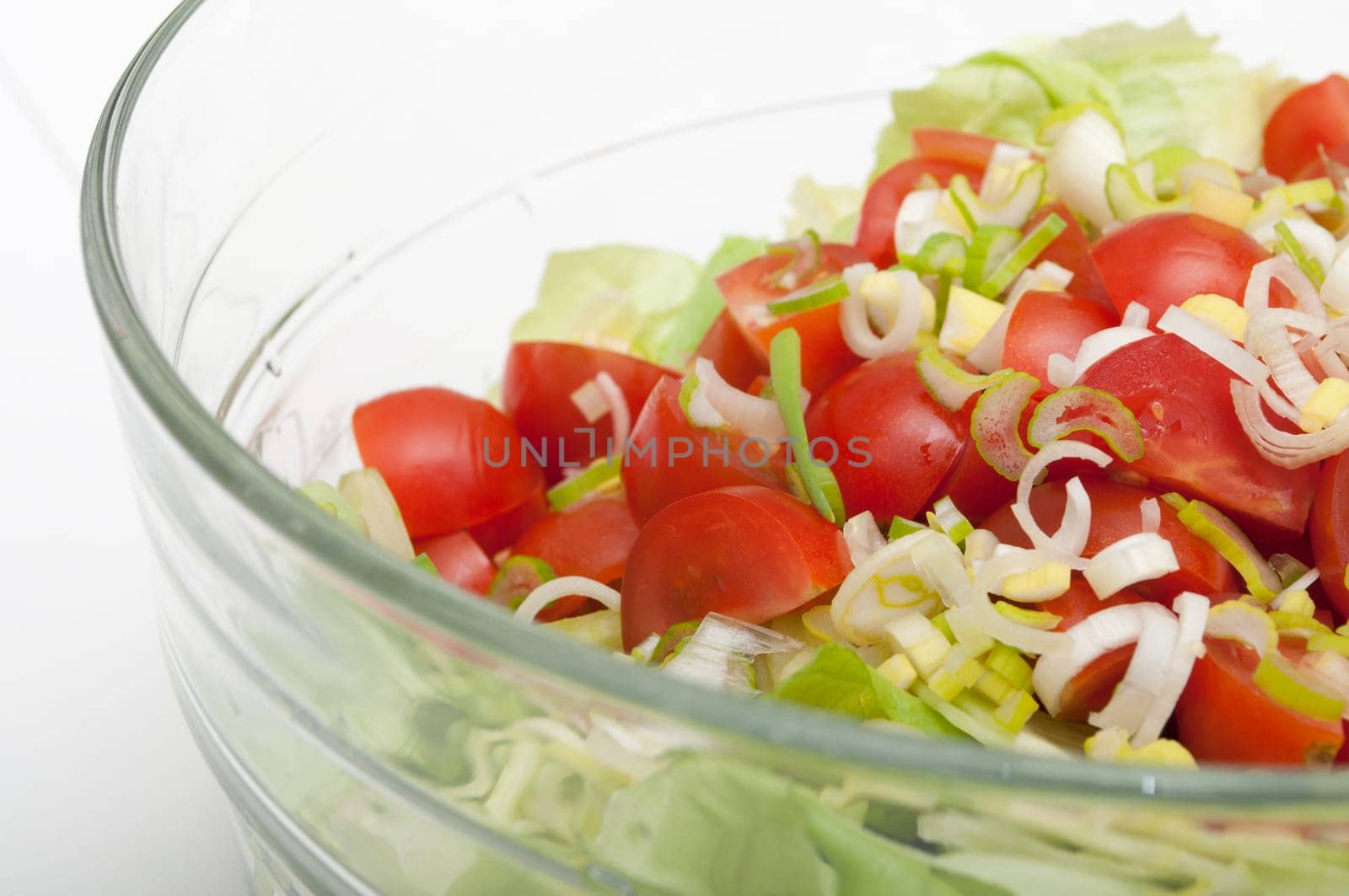 Closeup of Fresh Salad of Green Vegetables in Glass Bowl