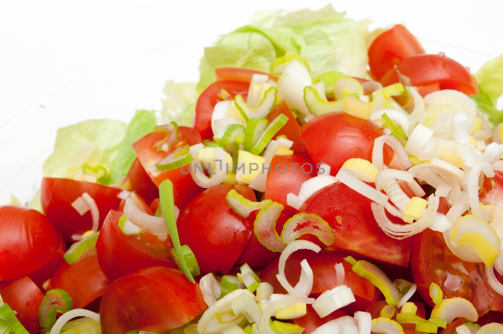 Closeup of Fresh Salad of Green Vegetables in Glass Bowl