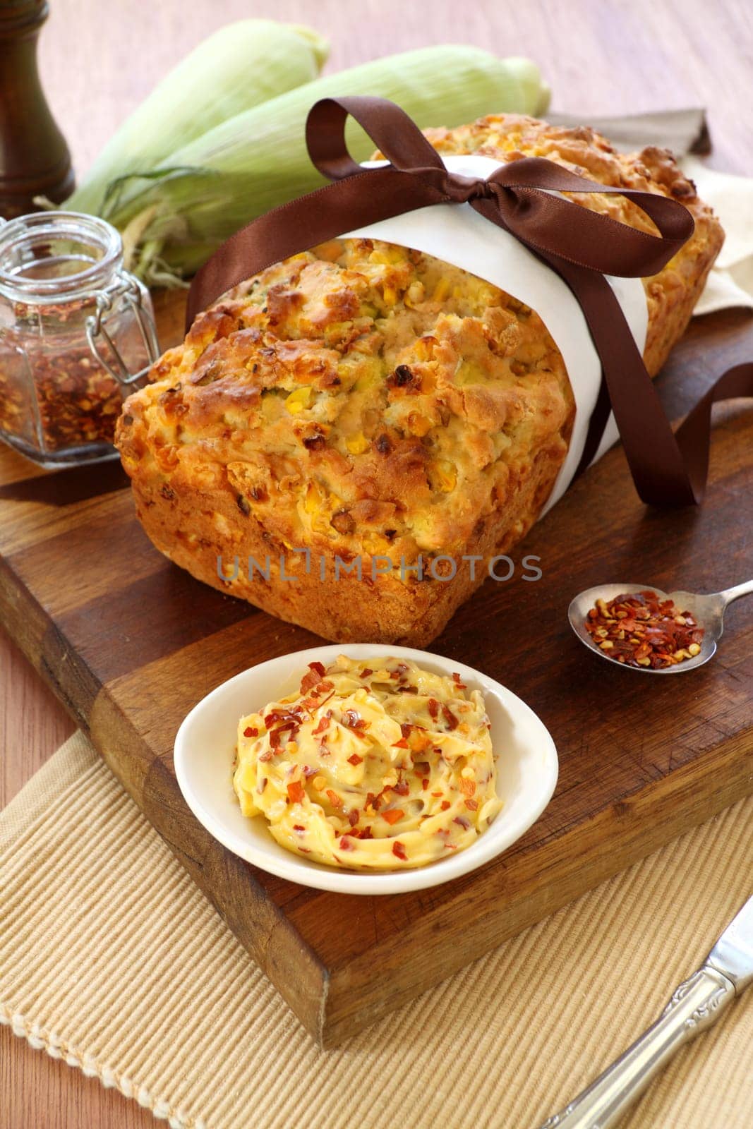 Fresh baked corn bread with chillii butter and dried chillies.