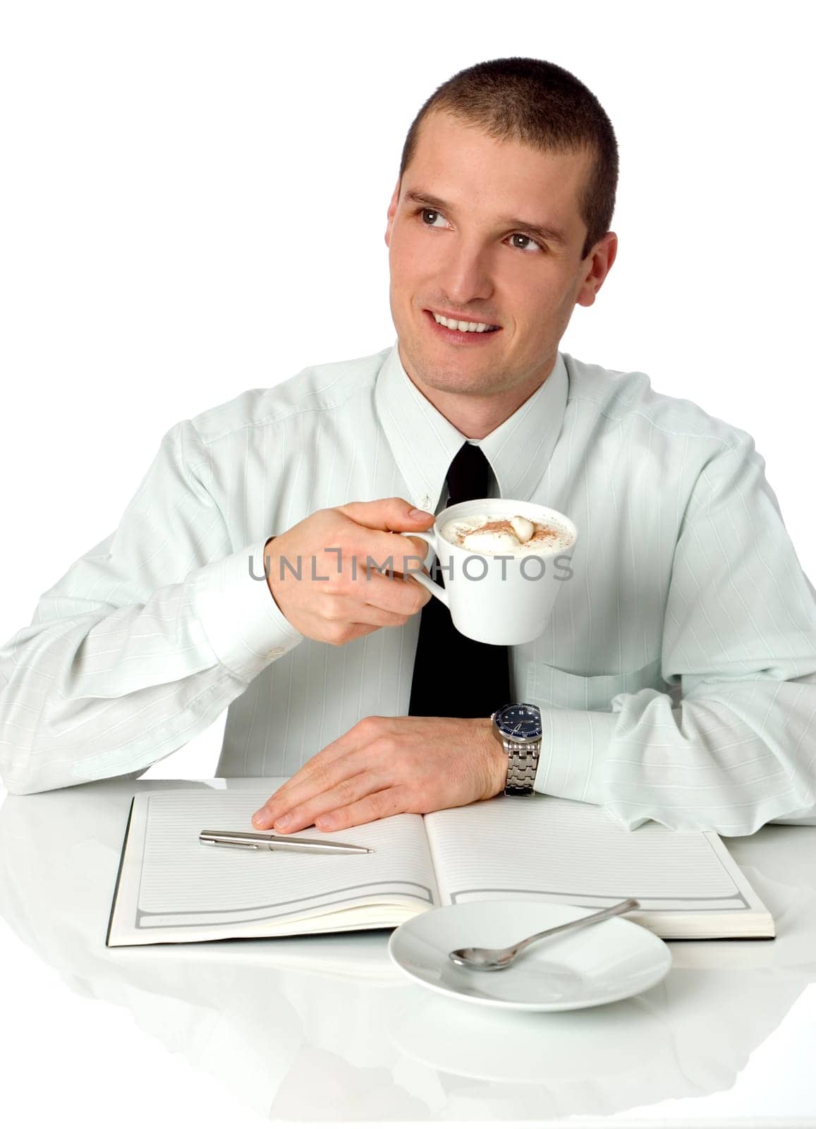 businessmen drinking coffee behind the table close up