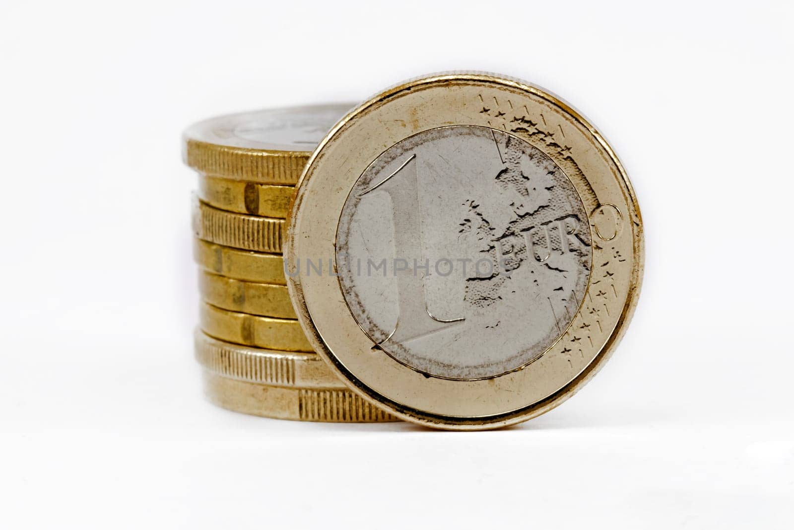two coins euros stacks isolated on white background