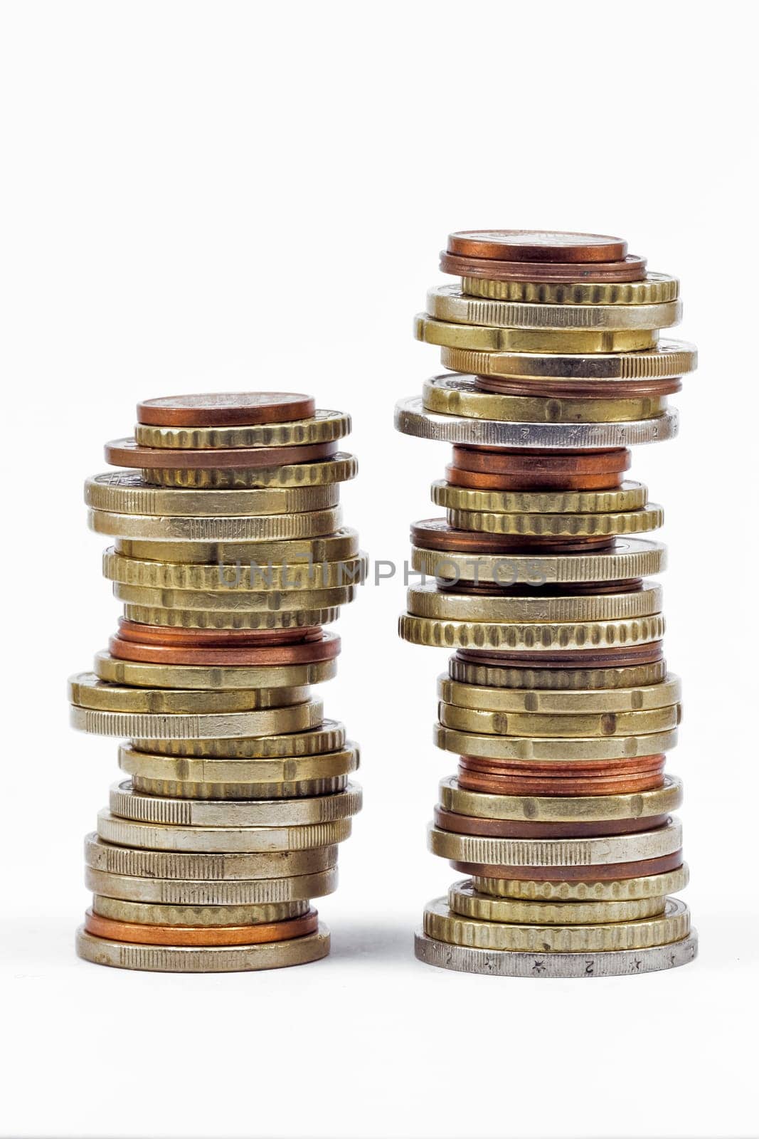 two coins euros stacks isolated on white background
