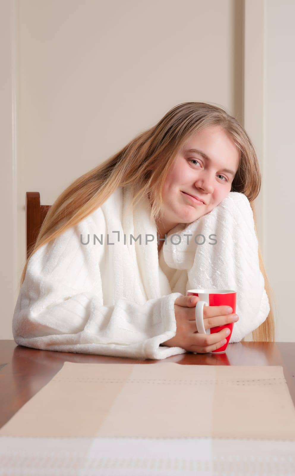 young woman having coffee in the morning