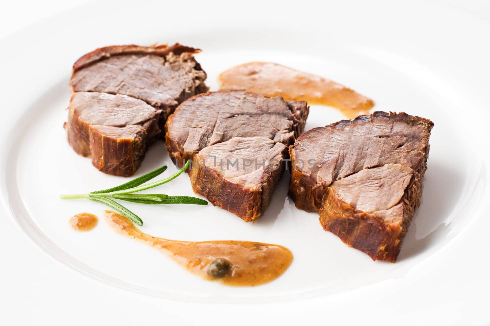 Roasted deer meat sliced close up shoot
