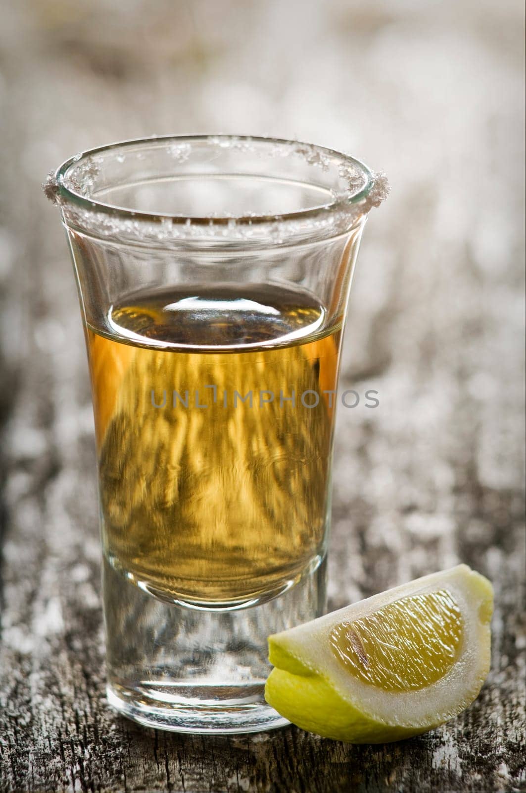 tequila shot, with lemon and salt close up