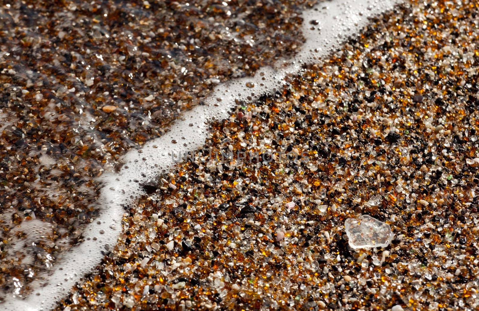 Fragments on Glass Beach in Kauai with old pieces of bottles