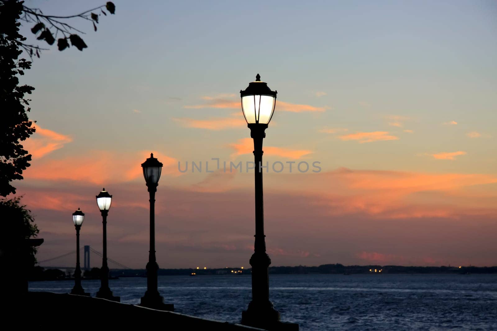 Beachfront in New York with lanterns at sunset
