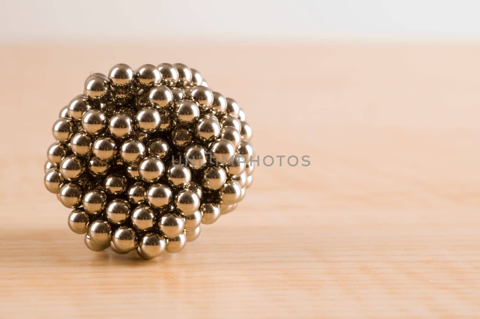 Ball of Magnets on Table.