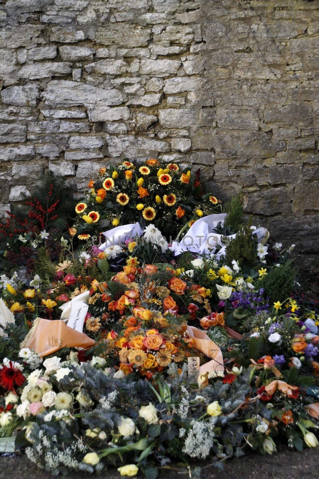 Floral decorations on a fresh grave