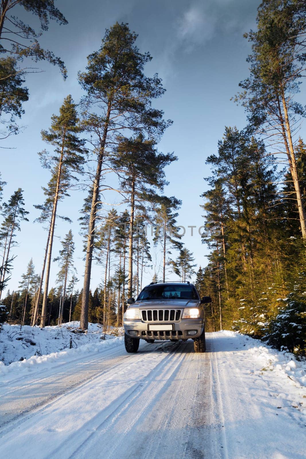 suv, car, driving on snowy road, winter in sweden