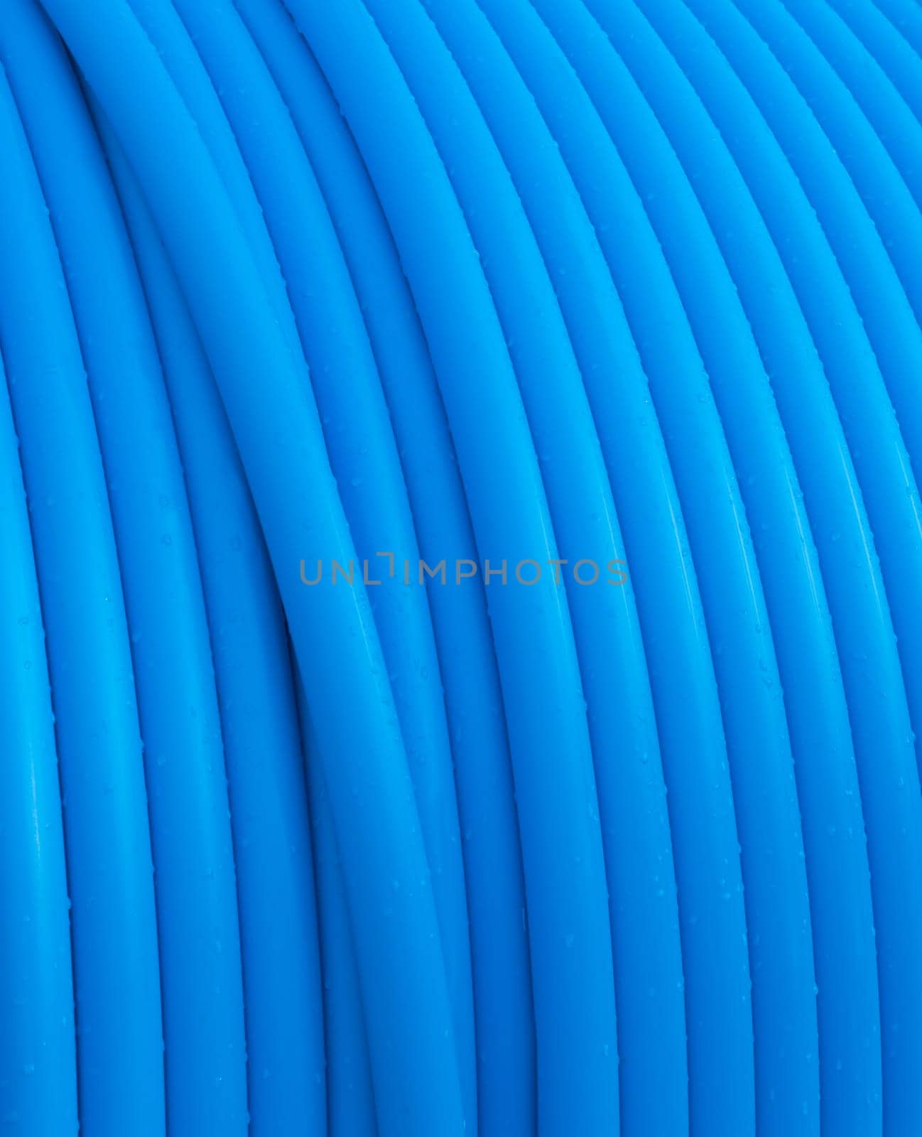 close-up op blue cable on a cable drum