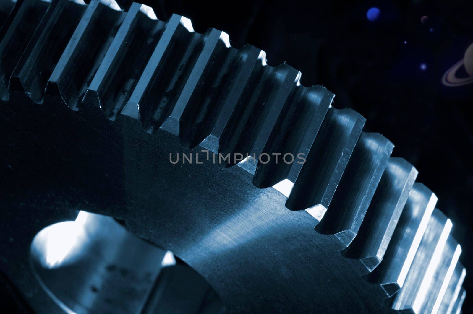 giant titanium gear wheel set against black