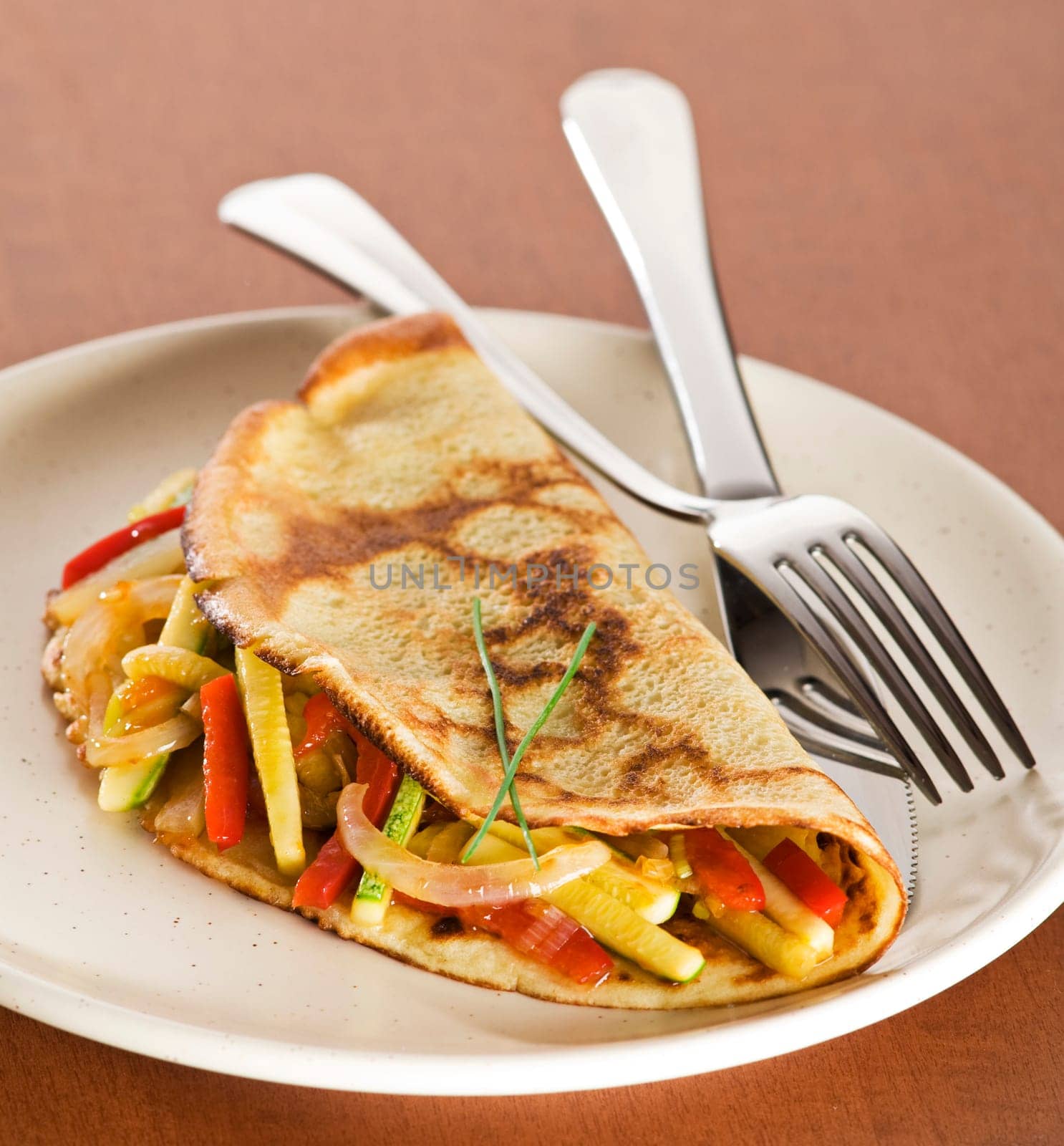 Fresh pancake with vegetables close up shoot