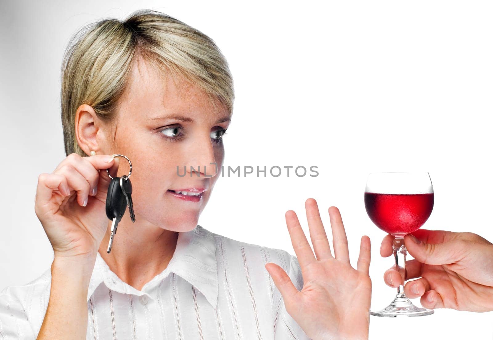 young blond woman with car keys declining drink close up