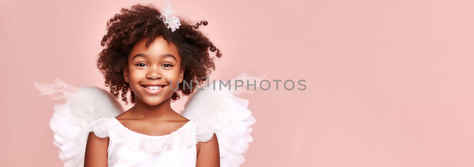 Banner of african american girl in white angel halloween costume looking at camera and smiling over pink background. Happy Halloween. Trick or treat