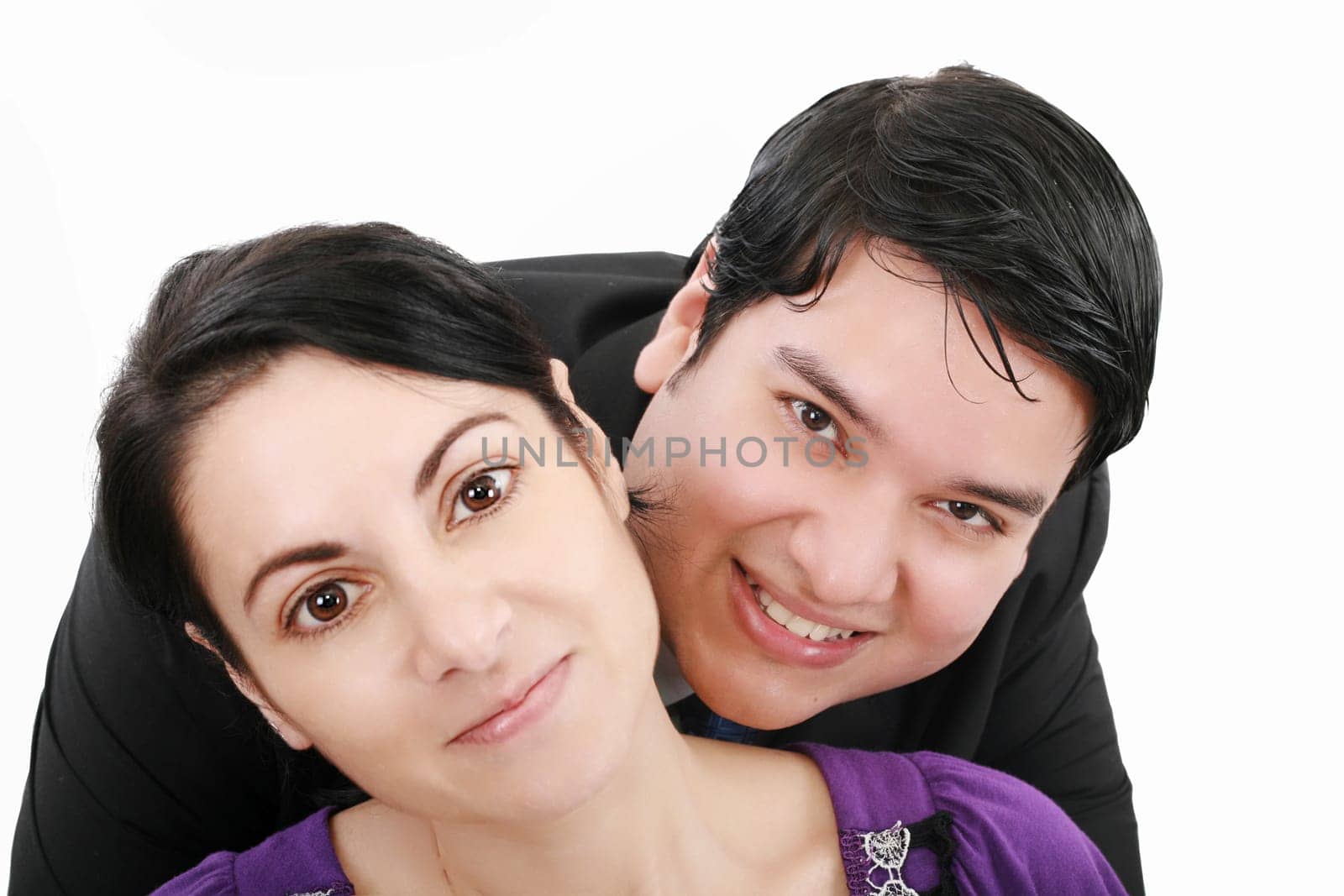 Close-up of beautiful young couple isolated on white background