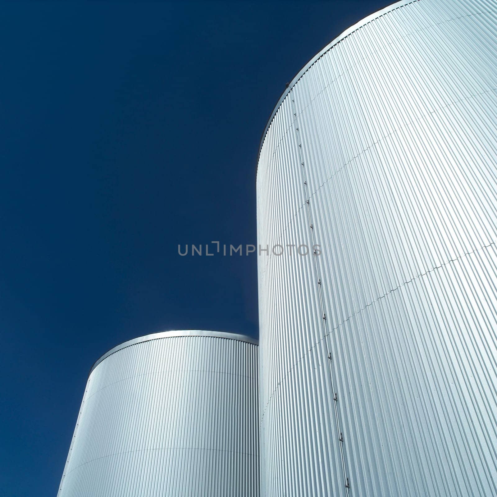 Storage Tanks in front of blue sky