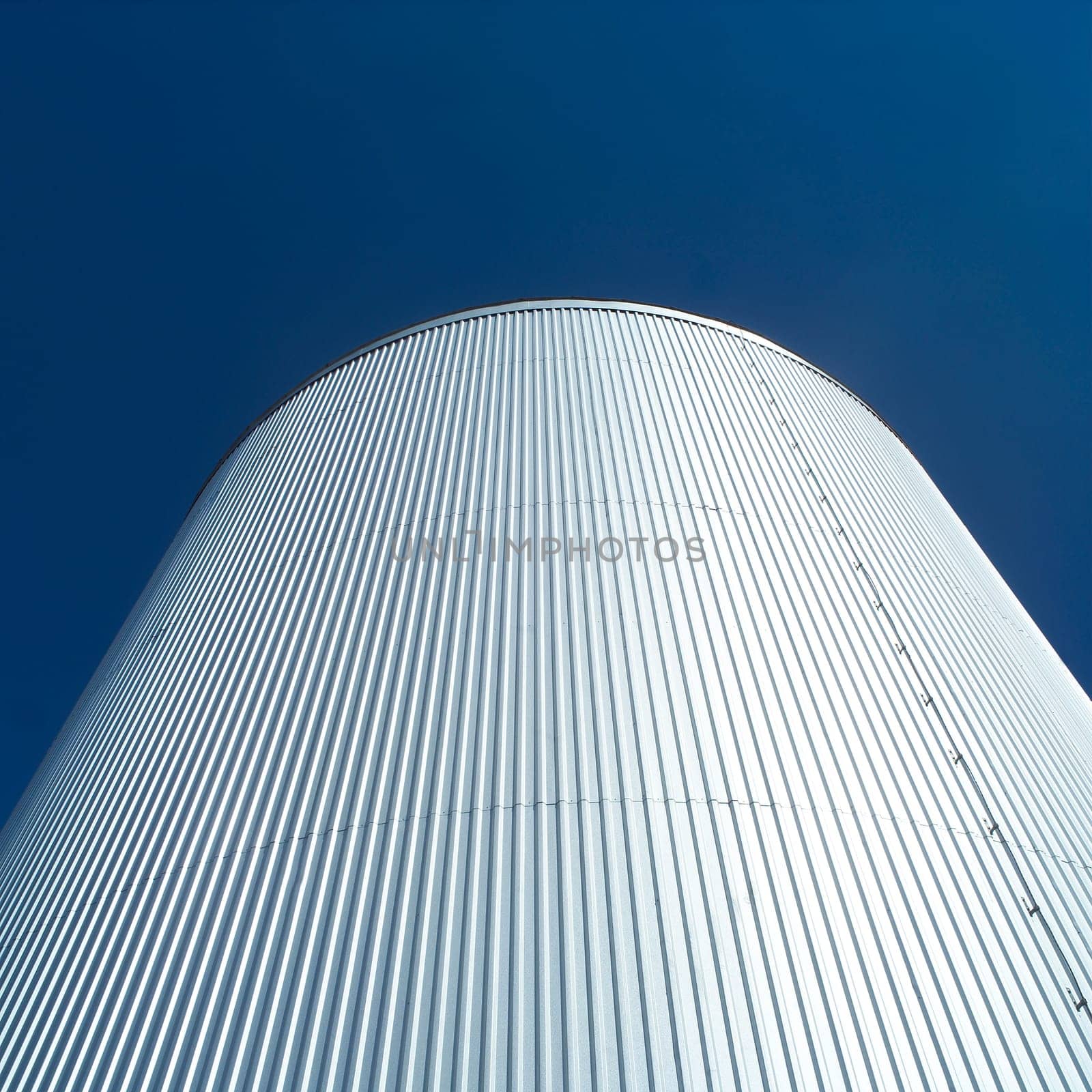 Storage Tank in front of blue sky