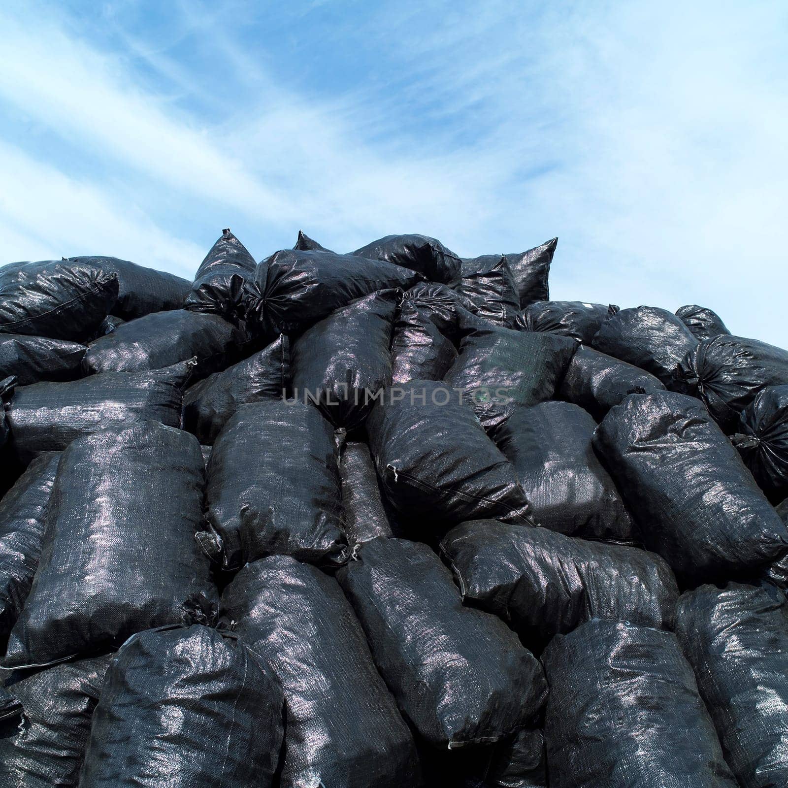 Large group of Garbage Bags towards blue sky