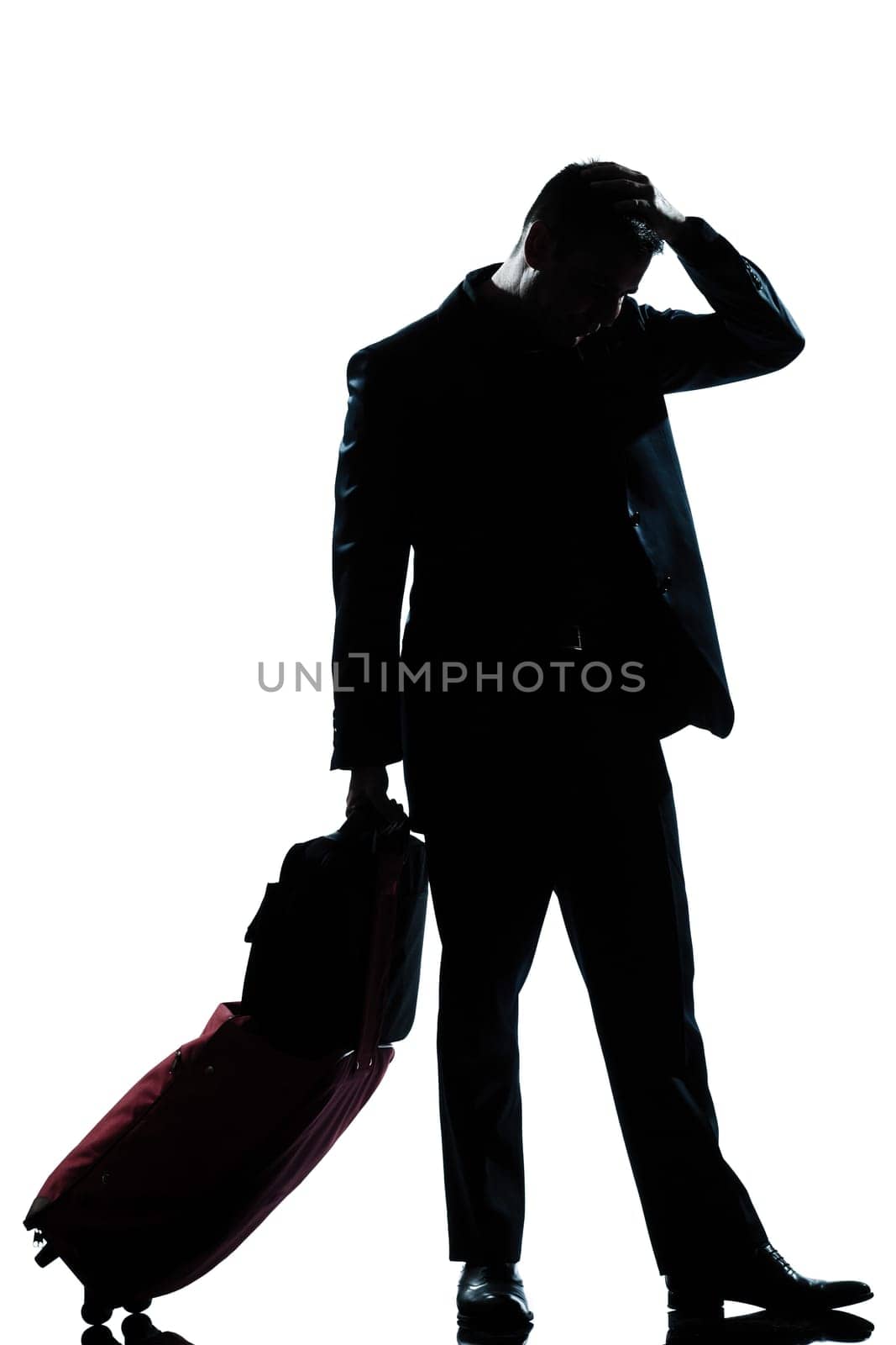 one caucasian man full length silhouette in studio isolated white background